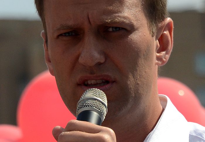 Russian opposition leader Alexey Navalny, who is standing for Moscow mayor while facing prison for fraud delivers a speech during a campaign meeting in Moscow on August 8, 2013. AFP PHOTO / VASILY MAXIMOV