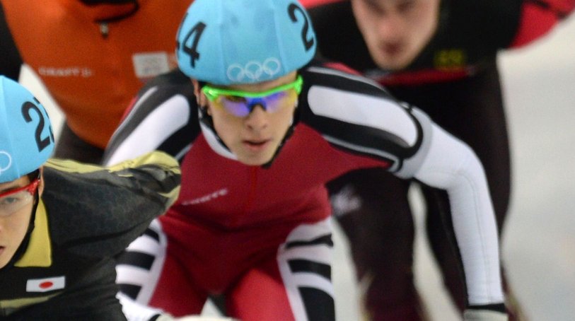 (L-R) Great Britain’s Jack Whelbourne, Italy’s Yuri Confortola, Japan’s Yuzo Takamido, Latvia’s Roberto Pukitis, Netherlands’ Sjinkie Knegt and Germany’s Robert Seifert compete in the Men’s Short Track 1500 m Heats at the Iceberg Skating Palace during the Sochi Winter Olympics on February 10, 2014. AFP PHOTO / YURI KADOBNOV