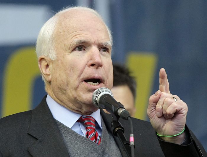 epa03991933 US Senator John McCain speaks during a pro-European rally on the Independence Square in Kiev, Ukraine, 15 December 2013. As Ukrainian President Viktor Yanukovych and leaders of Ukrainian opposition participated in a round table event to discuss public proposals aimed at achieving political stability, public peace and tranquility in Ukraine, the mass demonstrations in Kiev continued, with up to 20,000 anti-government protesters reinforcing barricades, emboldened by police assurances that they would not be cleared by force. Ukraine hopes to continue work on an association deal with the European Union, a spokesman for Prime Minister Nikolai Azarov said 15 December. Ukraine would only react to official EU comments on the state of negotiations, he told Russia’s Interfax news agency, indicating Ukraine was not acknowledging a Sunday tweet from the EU’s neighbourhood policy commissioner saying the talks were ‘on hold.’ EPA/TATYANA ZENKOVICH EPA/TATYANA ZENKOVICH