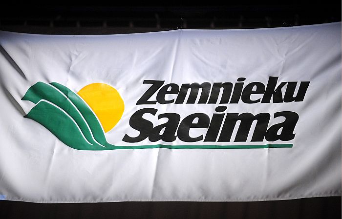 Lauksaimnieku organizācijas “Zemnieku saeima” logo konferencē “Lauksaimniecības zeme – Latvijas stratēģiskais resurss” Ādažos.