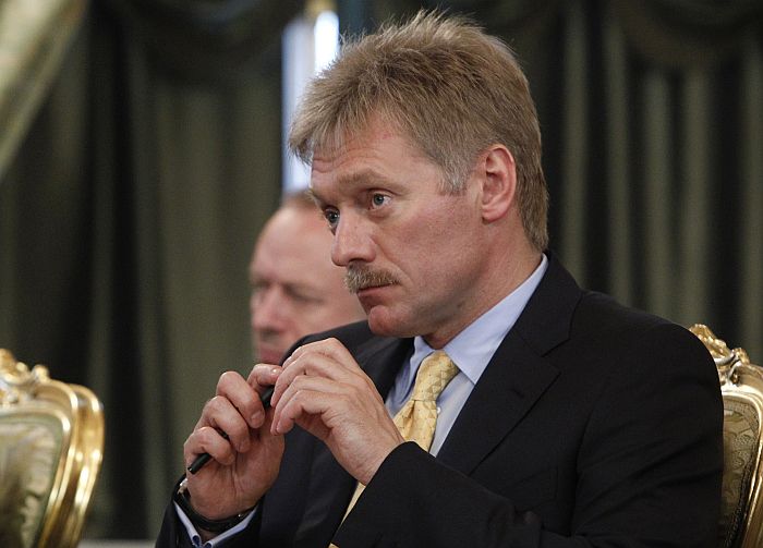 Kremlin spokesman Dmitry Peskov attends a meeting of Russia’s President Vladimir Putin with his Venezuelan counterpart Nicolas Maduro at the Kremlin in Moscow, on July 2, 2013. AFP PHOTO / POOL/ MAXIM SHEMETOV