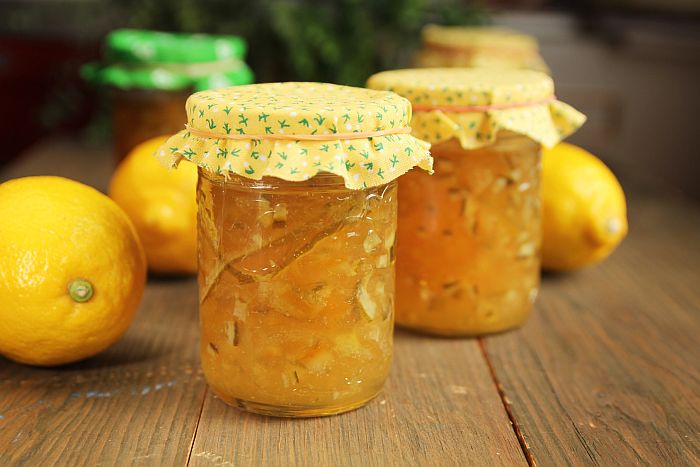 Citrus and ginger jam on wood table