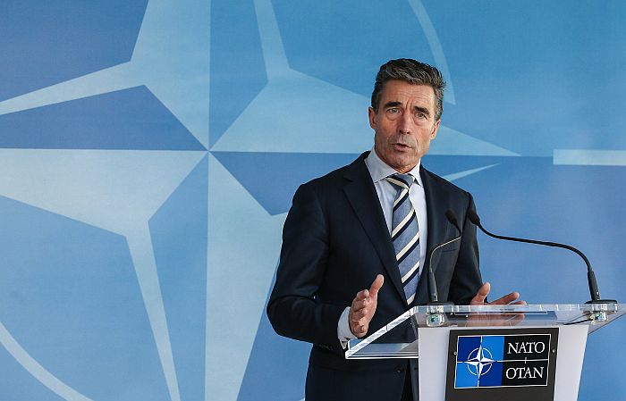 epa04105874 Danish NATO Secretary General Anders Fogh Rasmussen speaks at a media briefing at the Nato headquarters in Brussels, Belgium, 02 March 2014. Russia’s military actions in Ukraine pose a threat to Europe, NATO chief Rasmussen said 02 March ahead of special talks by the alliance’s ambassadors on the crisis. NATO leaders met 02 March after the interim Ukrainian government requested the alliance’s support against Russia, whose parliament authorized the use of military force in the country. Reports state that Poland asked for an emergency meeting of the Council of the North Atlantic Treaty Organization NATO, feeling threatened by the potential armed intervention of Russia in neighboring Ukraine. EPA/JULIEN WARNAND