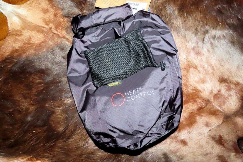 ‘Härkila Heat komplekts. Veste maisiņā, bateriju banka.