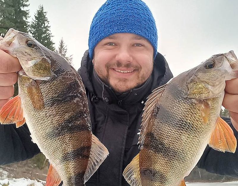 Rihards Millers ar saviem Alūksnes ezera kimlakiem.